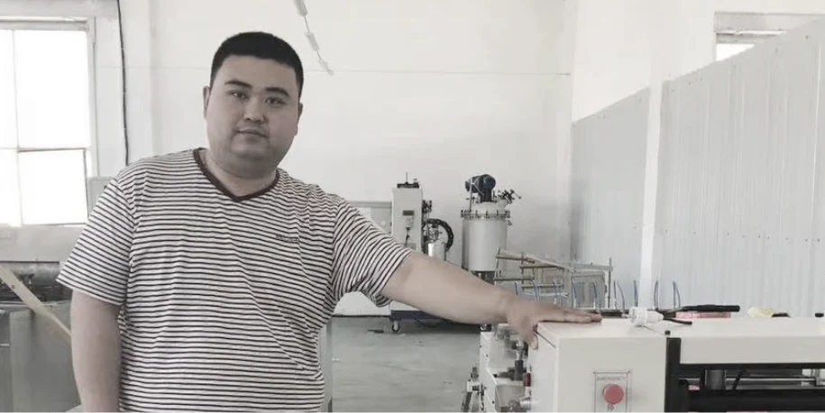 Our Chairman is standing in the workshop.