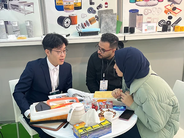 Our worker is explaining the product to our customers.
