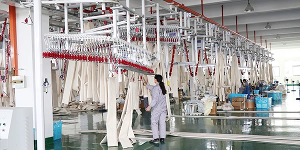 Workshop workers are checking dust collector filter bags.