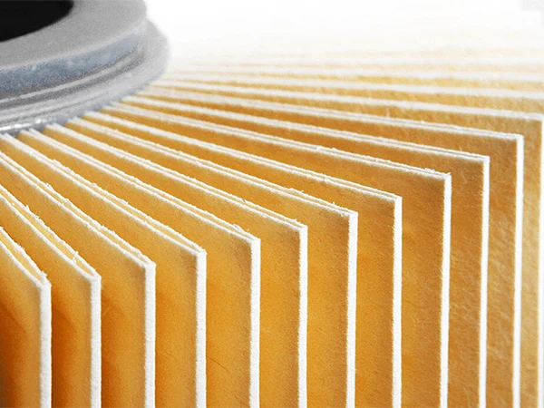 Local detail of the adhesive on the oil filter end cap