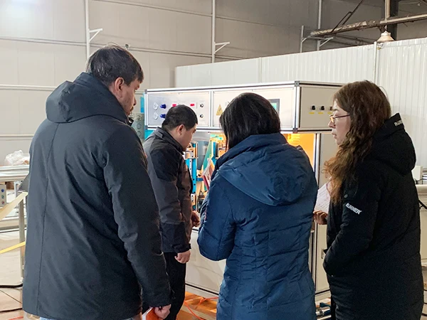 Our workers are leading customers on a factory tour.