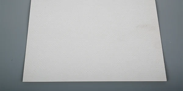 A sheet of white laminated filter paper.