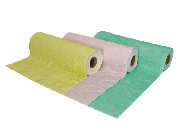 Three rolls of medium-efficiency filter media with different colors and a fiber layer