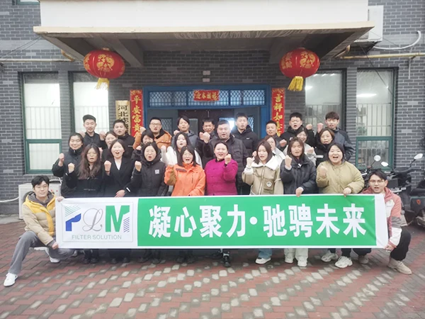 Employees taking a group photo