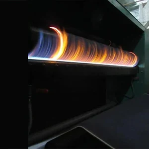 Singeing treatment with singeing machine