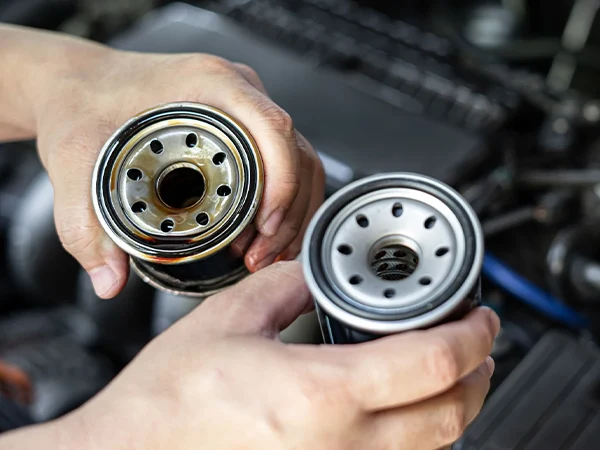 Replace spin-on fuel and oil filter