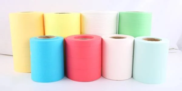 Various colorful fuel filter paper on a gray background