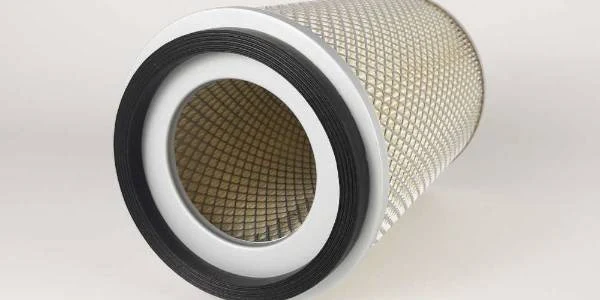 A truck air filter on a gray background