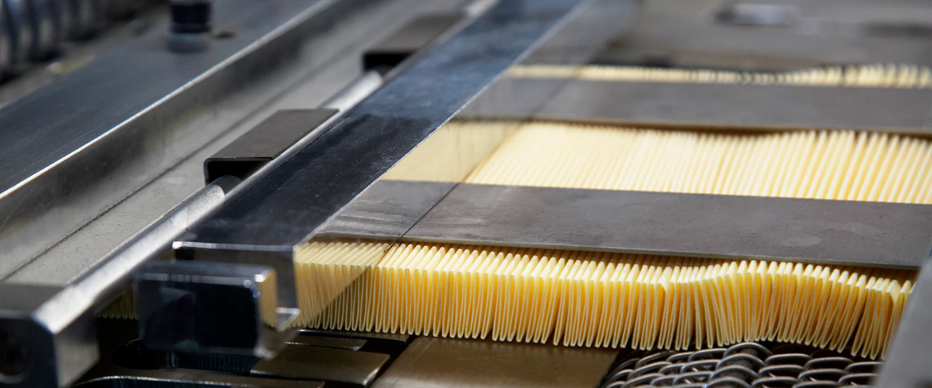 The pleating machine in the operation