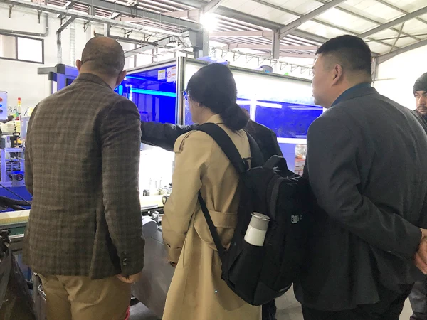 3people touring the factory