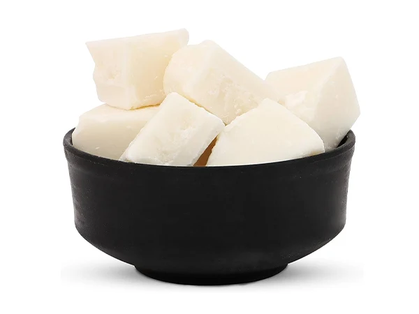 Large chunks of wax in a black bowl